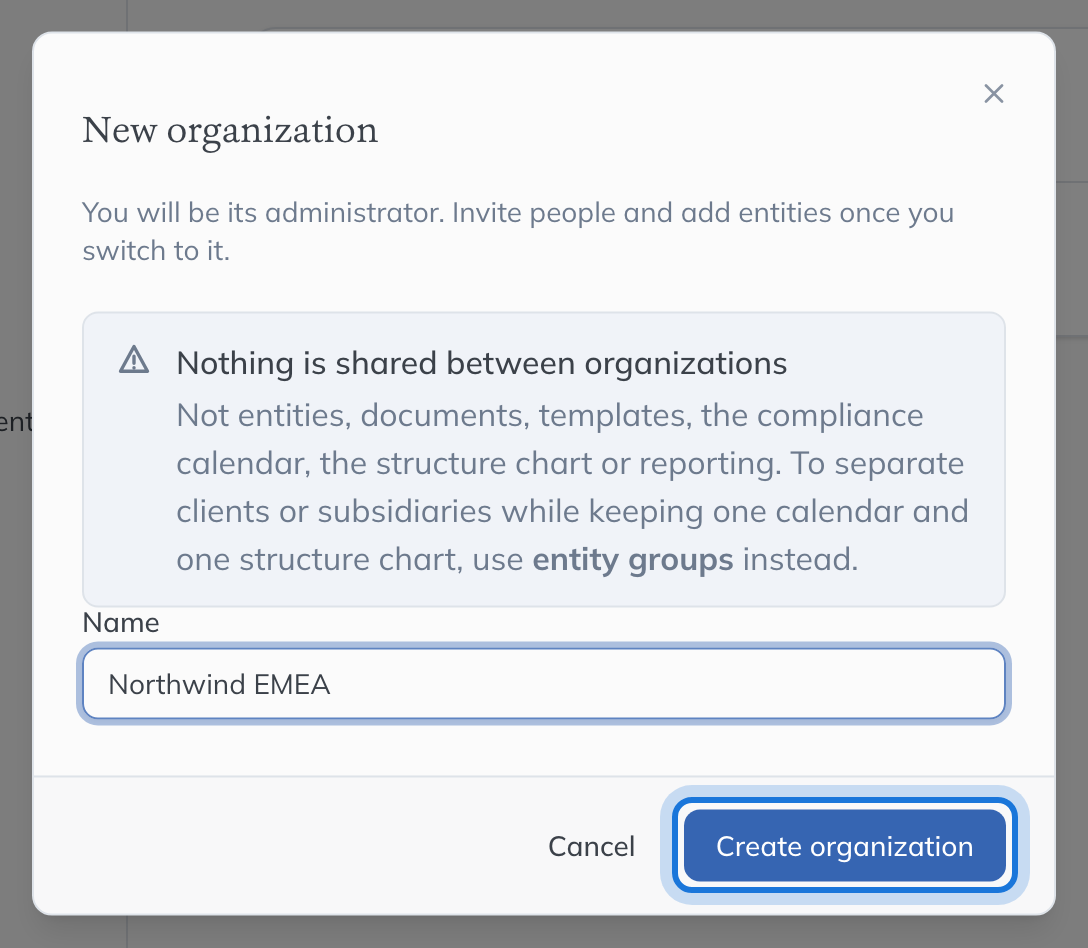 The New organization dialog, warning that nothing is shared between organisations, with a name entered and Create organization highlighted.