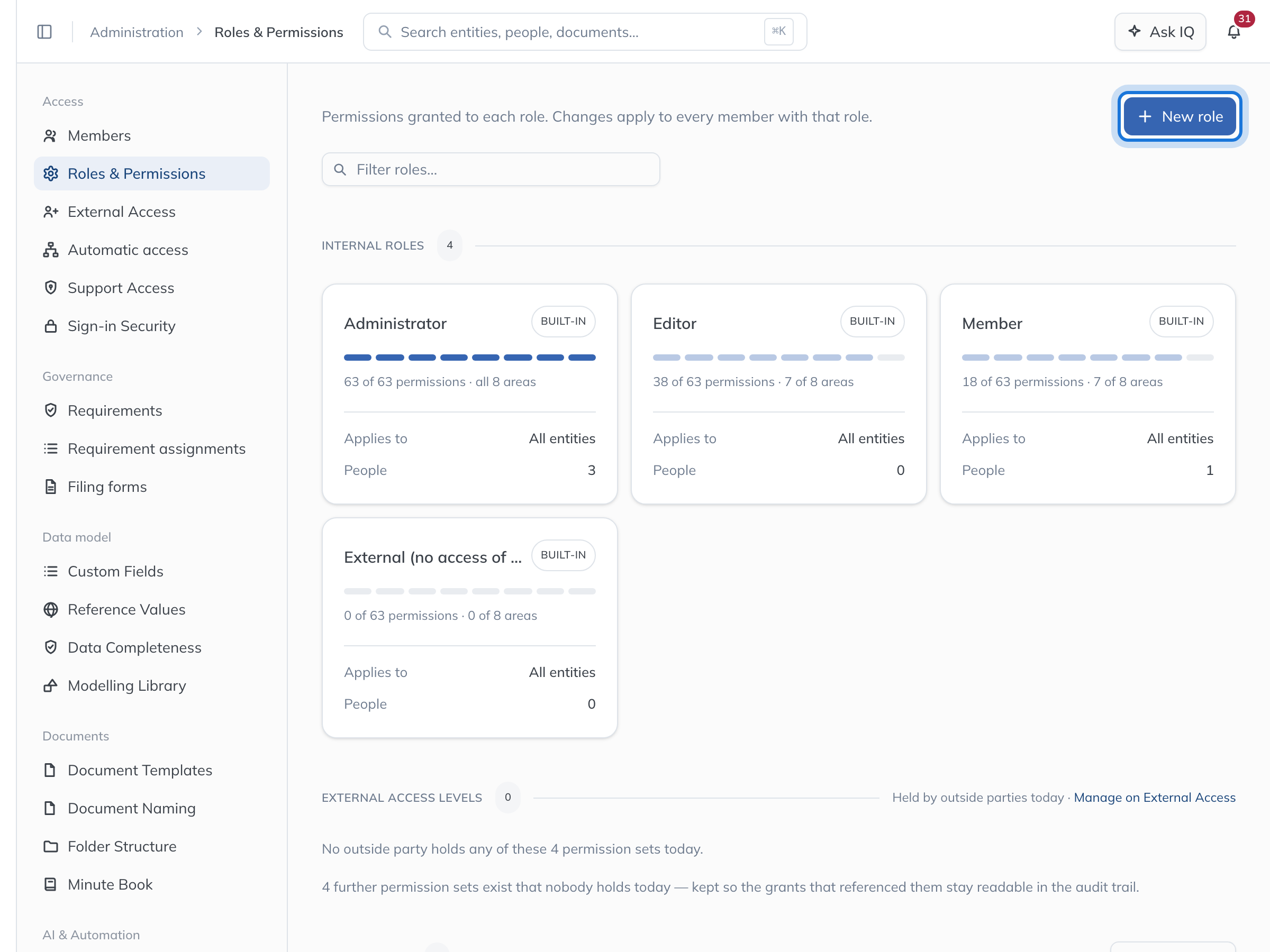 The Roles & Permissions page, with New role highlighted above the role cards.