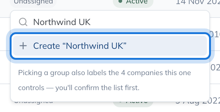 The company group picker with "Northwind UK" typed, offering to create it.