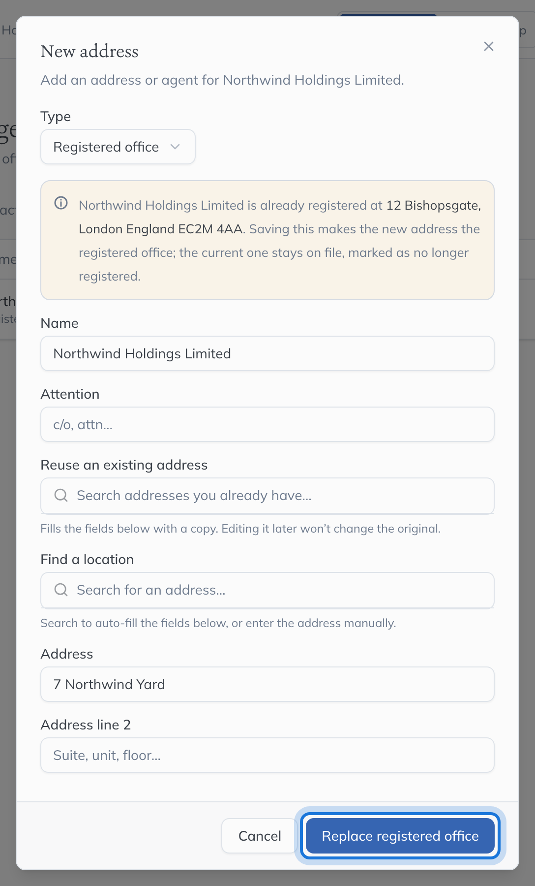 The New address dialog filled in, warning that it replaces the current registered office, with Replace registered office highlighted.