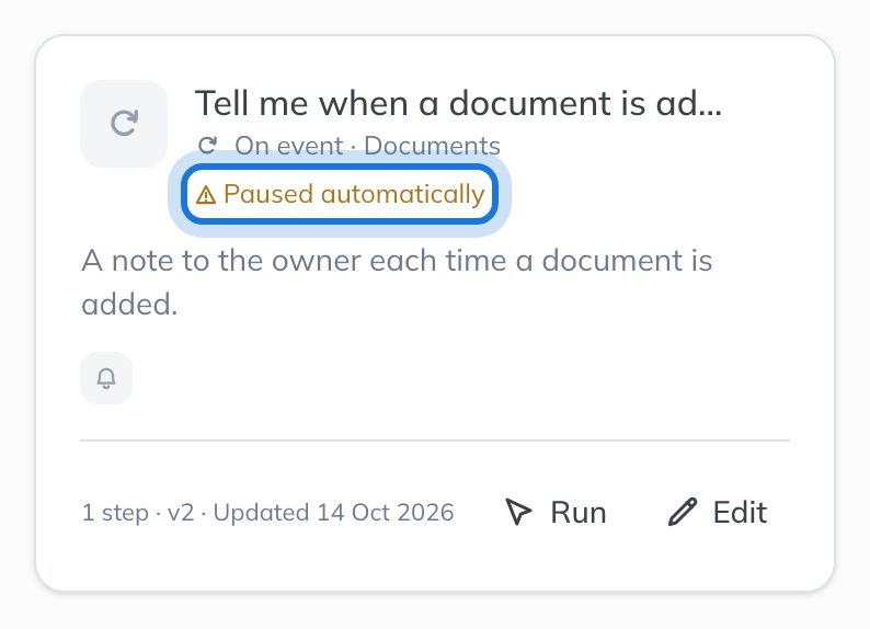 A workflow’s card in the library marked Paused automatically.